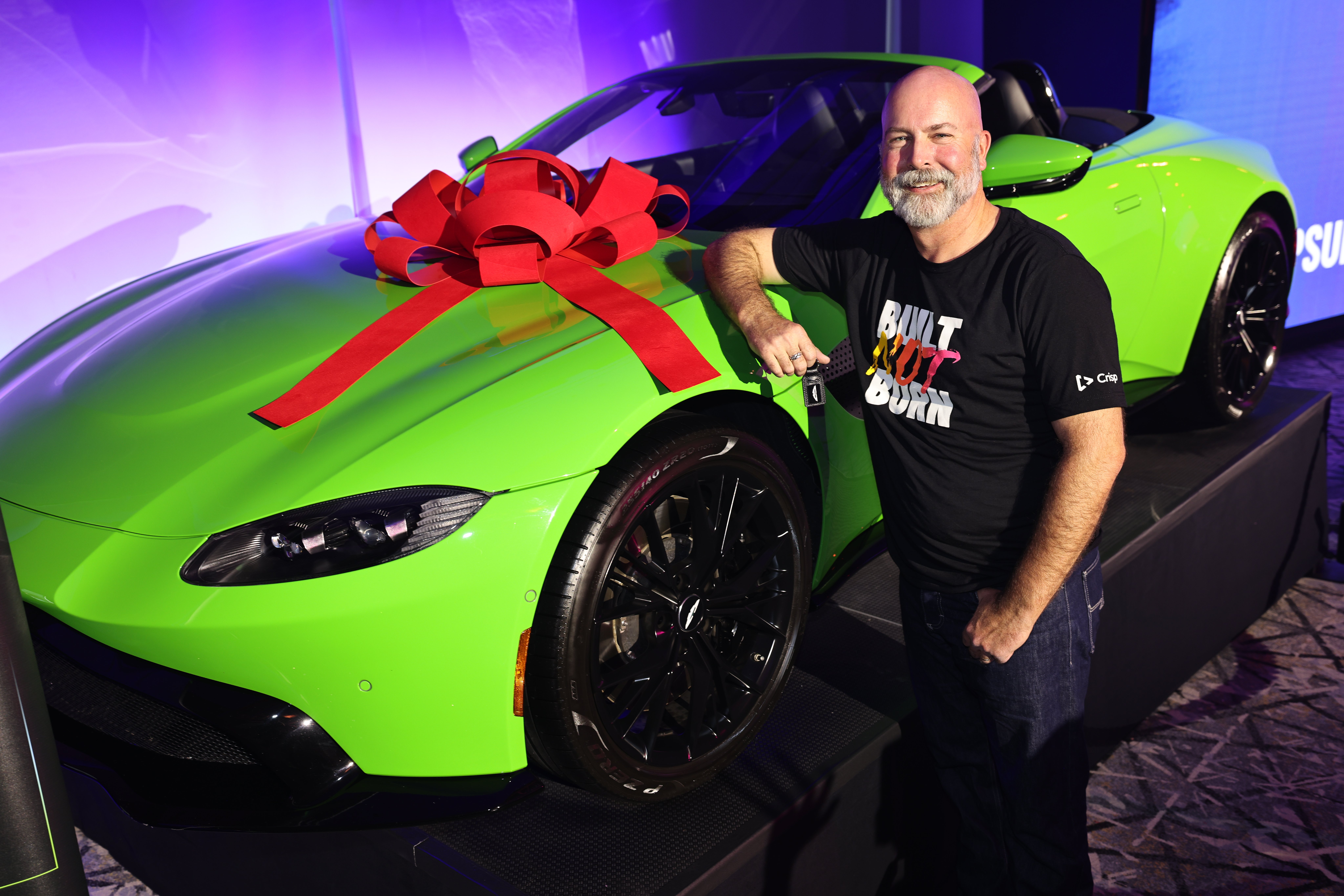 Crisp Gives Client Green Aston Martin
